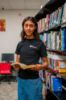 College student with a black cotton t-shirt